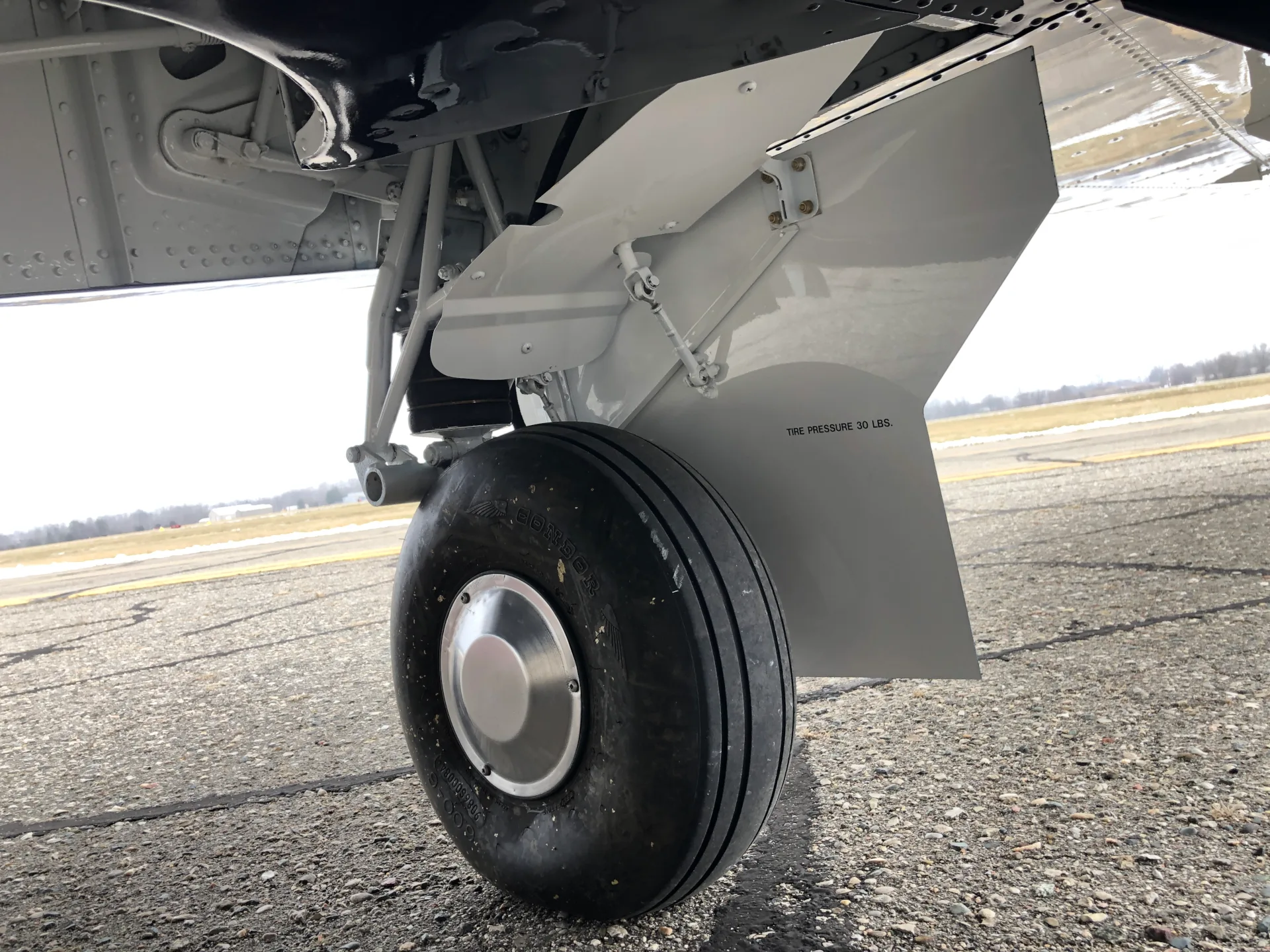 Engine detail of a 1967 Mooney M20F - Elite Air Service.