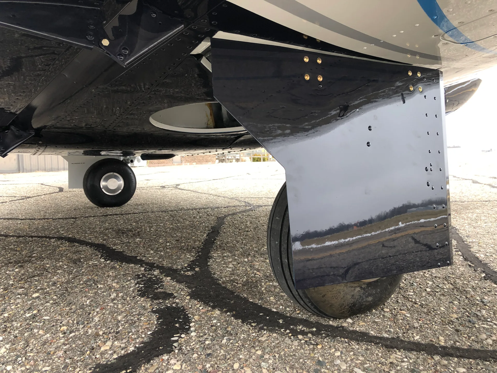 Engine detail of a 1967 Mooney M20F - Elite Air Service.
