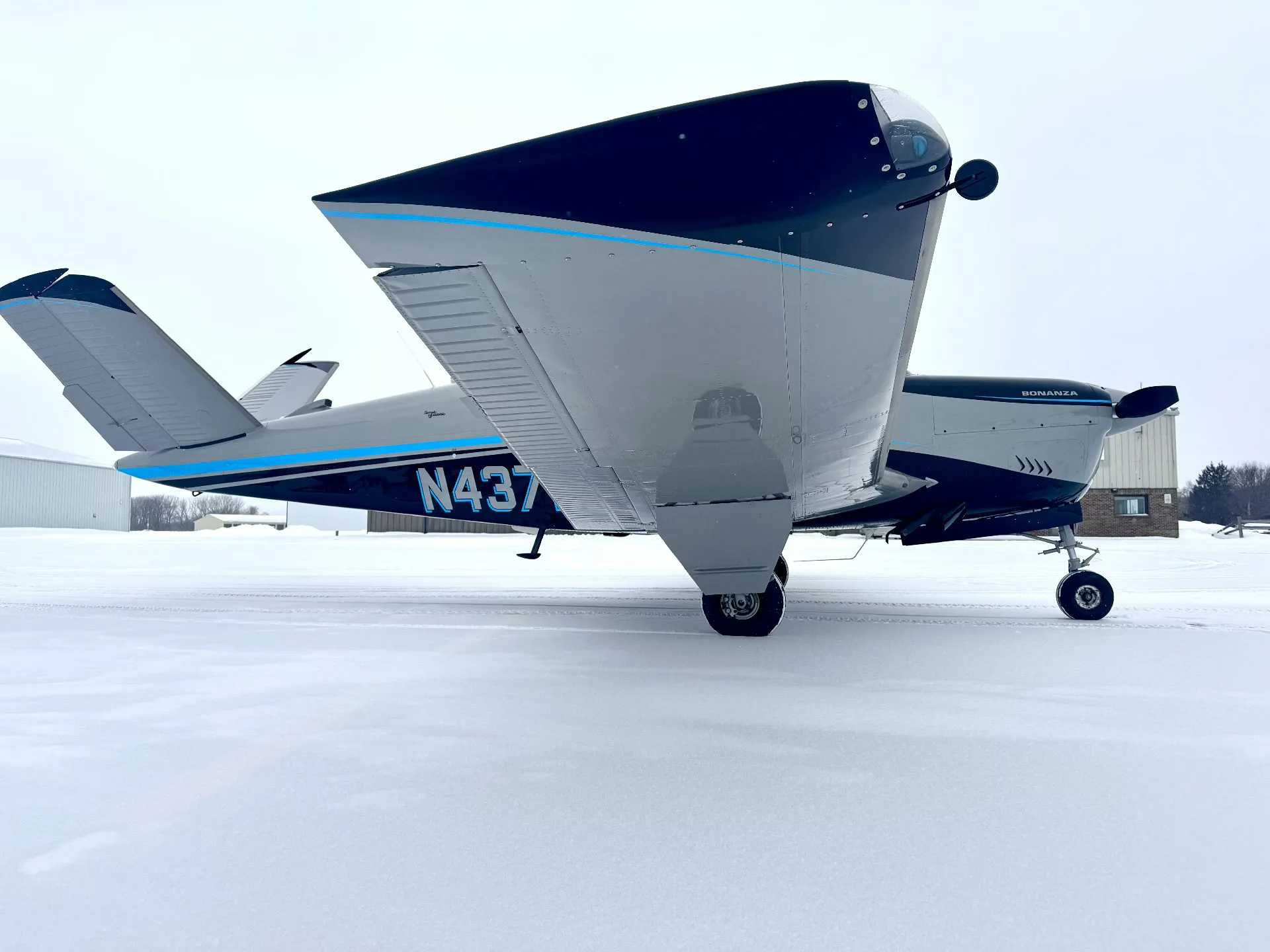 Marketing image of a 1966 Beech V35 Bonanza - Elite Air Service.