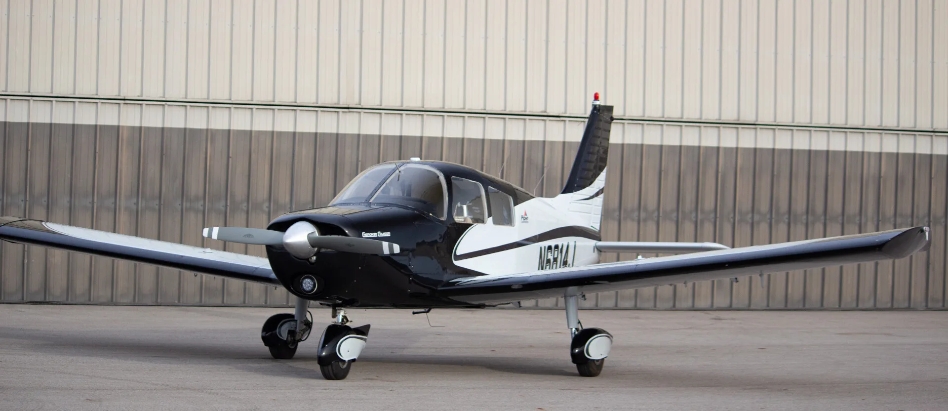 Exterior view of a 1976 Piper Cherokee Cruiser - Elite Air Service.