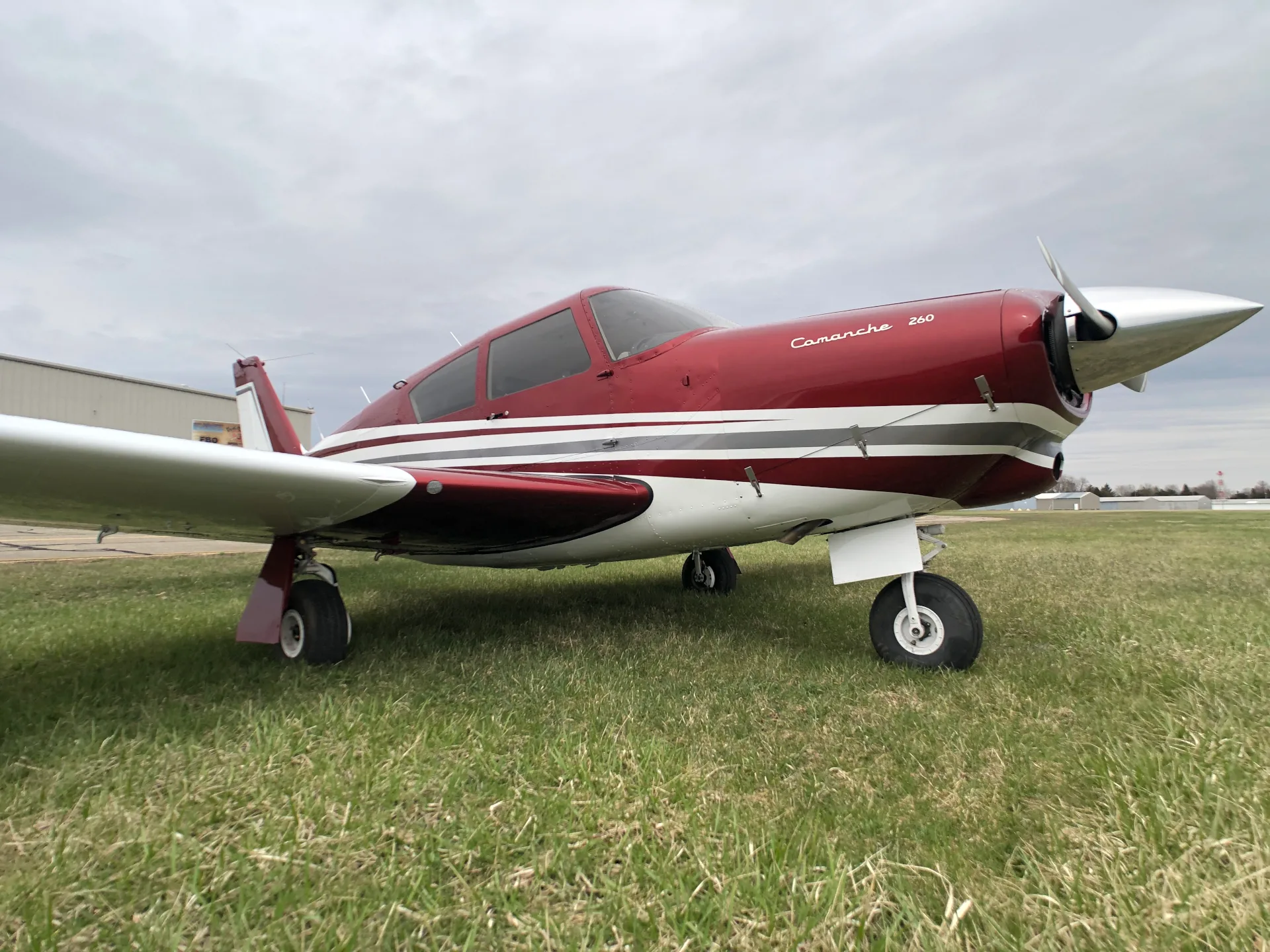 Exterior view of a 1964 Piper Comanche 260 New Scheme - Elite Air Service.
