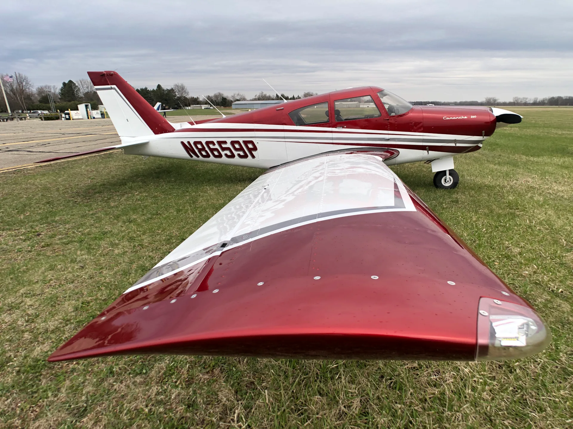 Exterior view of a 1964 Piper Comanche 260 New Scheme - Elite Air Service.