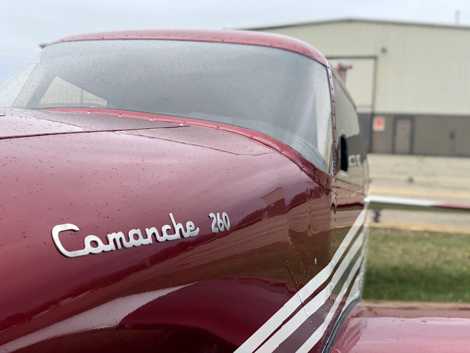 Exterior view of a 1964 Piper Comanche 260 New Scheme - Elite Air Service.