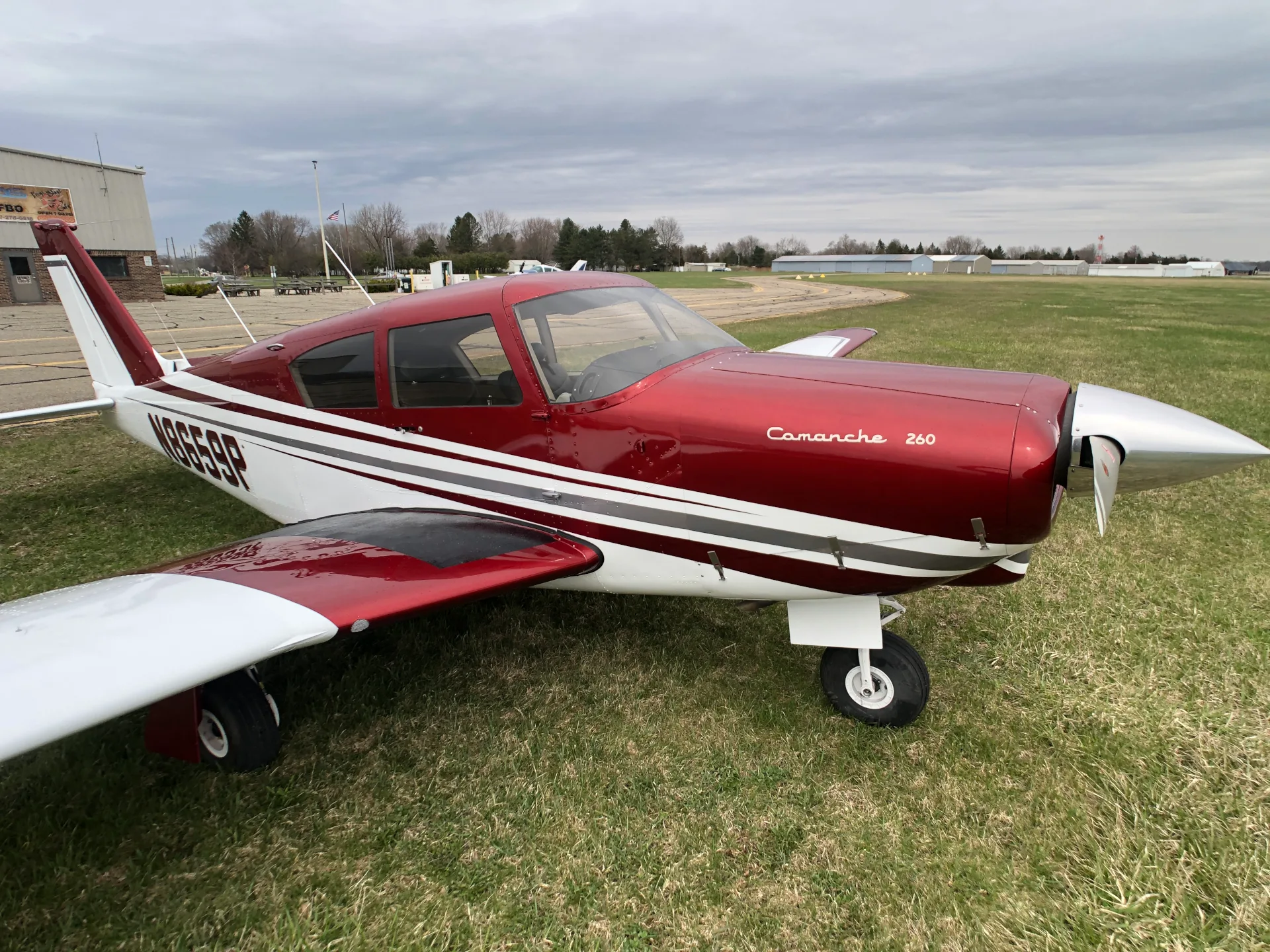 Exterior view of a 1964 Piper Comanche 260 New Scheme - Elite Air Service.