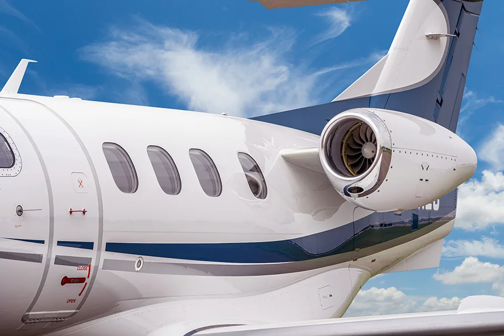 Marketing image of a 2012 Embraer Phenom 100.