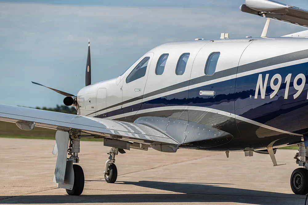 Exterior view of a 2018 Daher TBM 910, N919EA.