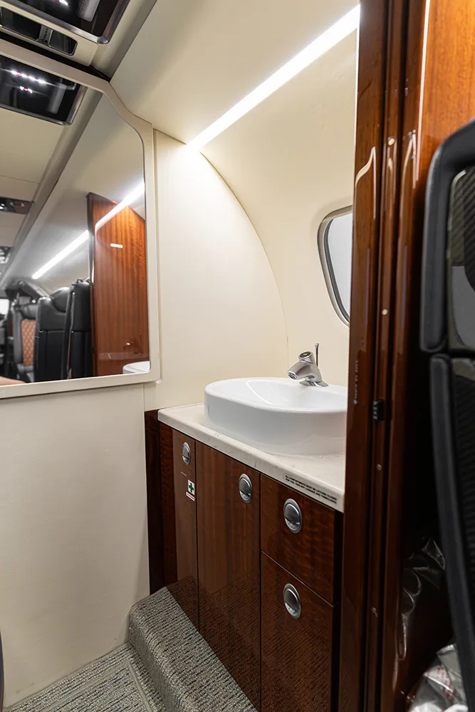 Cabin interior of a 2024 Embraer Phenom 300E.