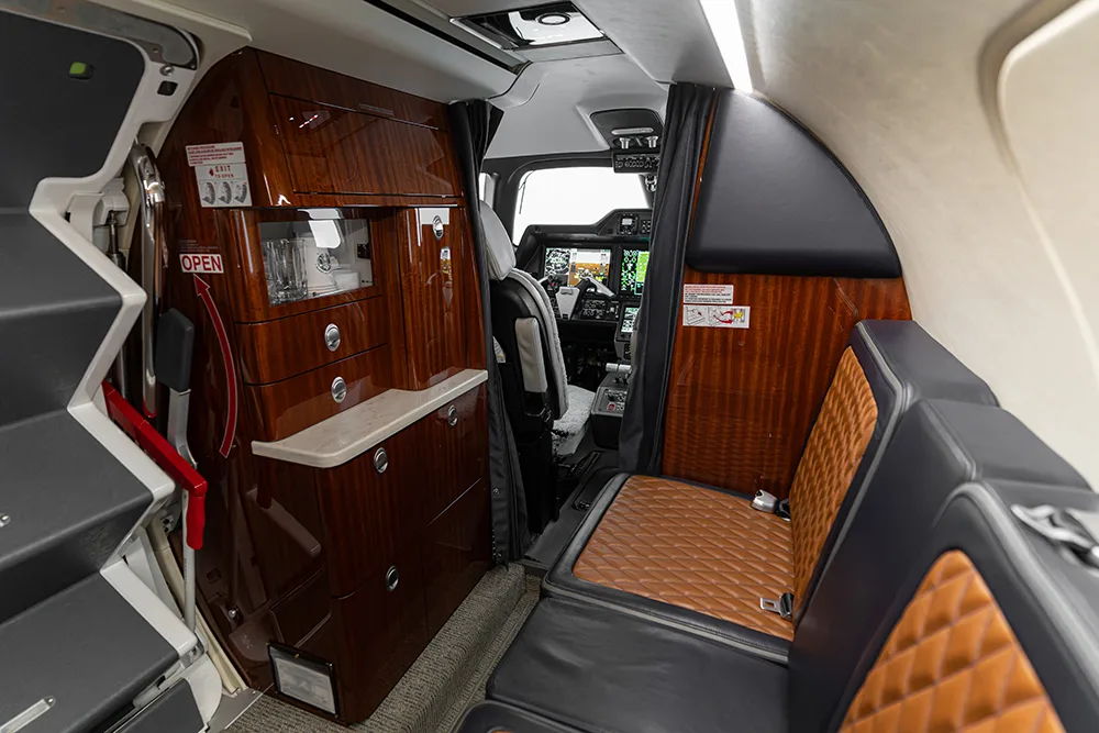 Cabin interior of a 2024 Embraer Phenom 300E.