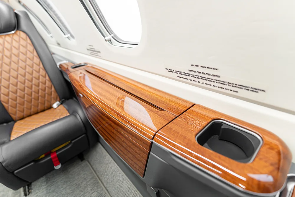 Cabin interior of a 2024 Embraer Phenom 300E.