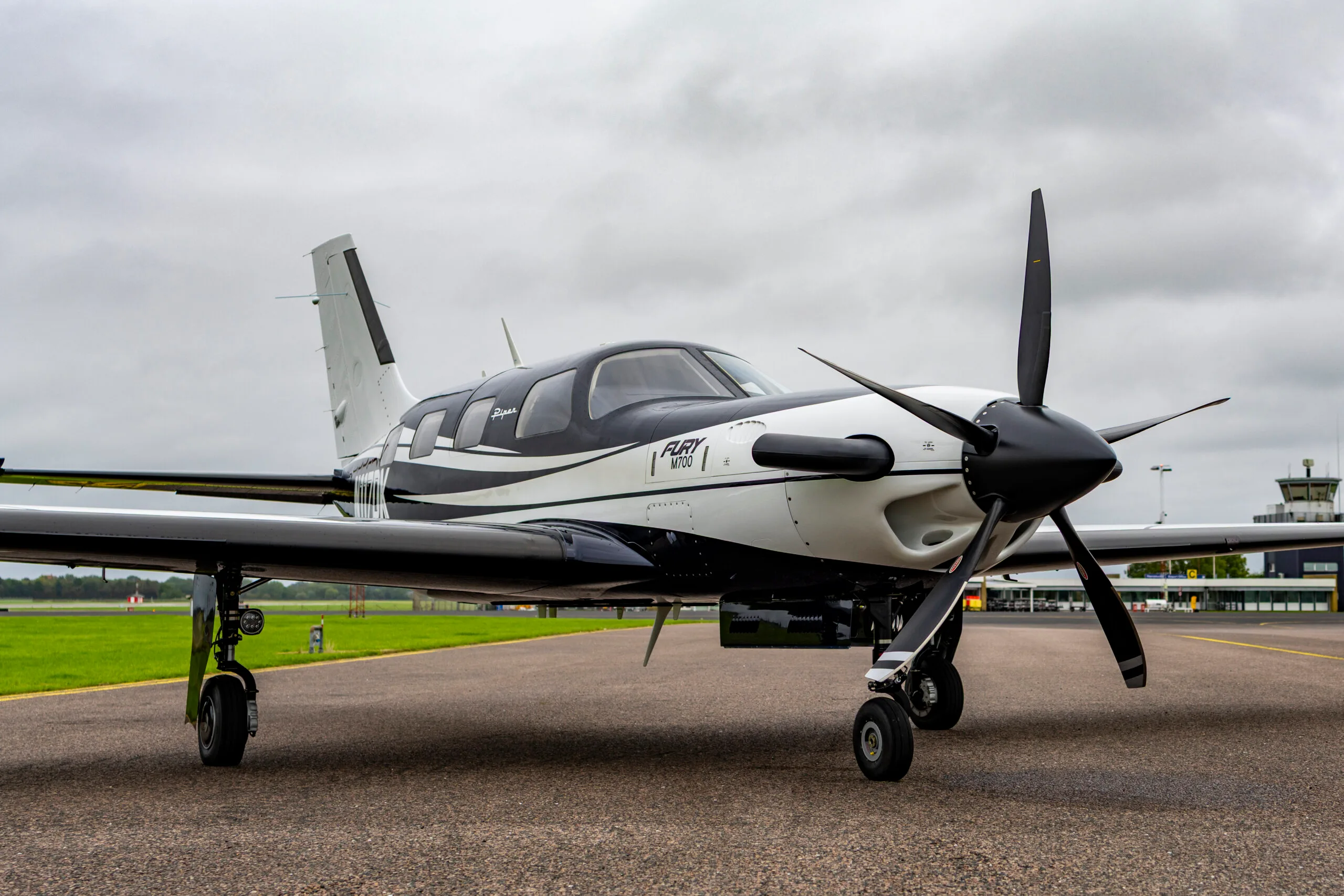 Exterior view of a 1977 Piper Turbo Arrow III, OY-BTM.