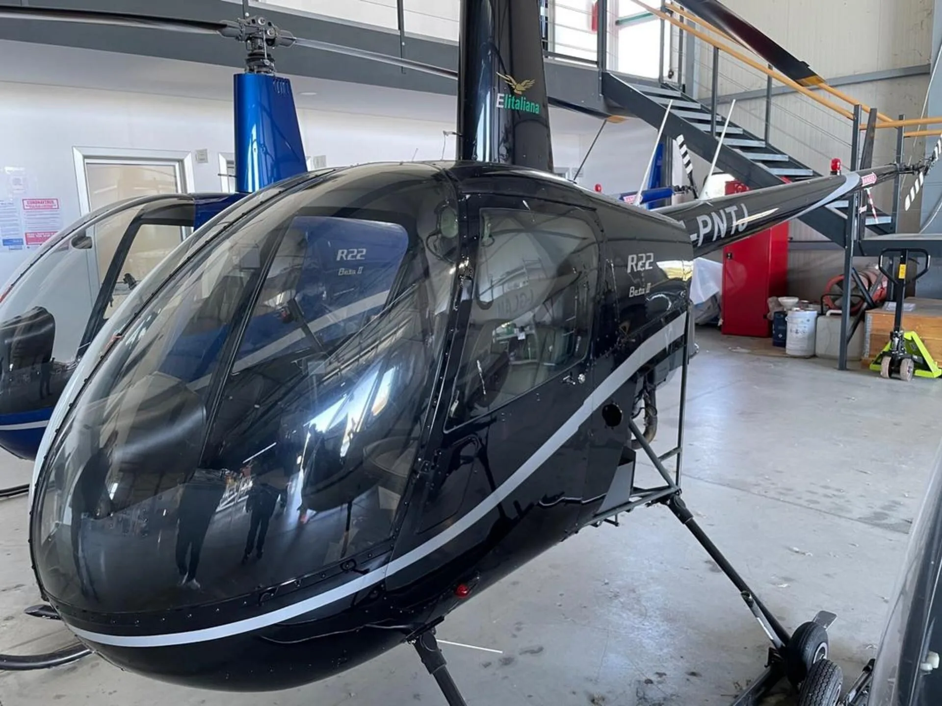 Exterior view of a 2007 Robinson R22 Beta II, I-PNTJ.