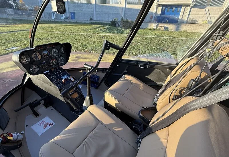 Exterior view of a 2010 Robinson R44 Raven II, I-AVGA.