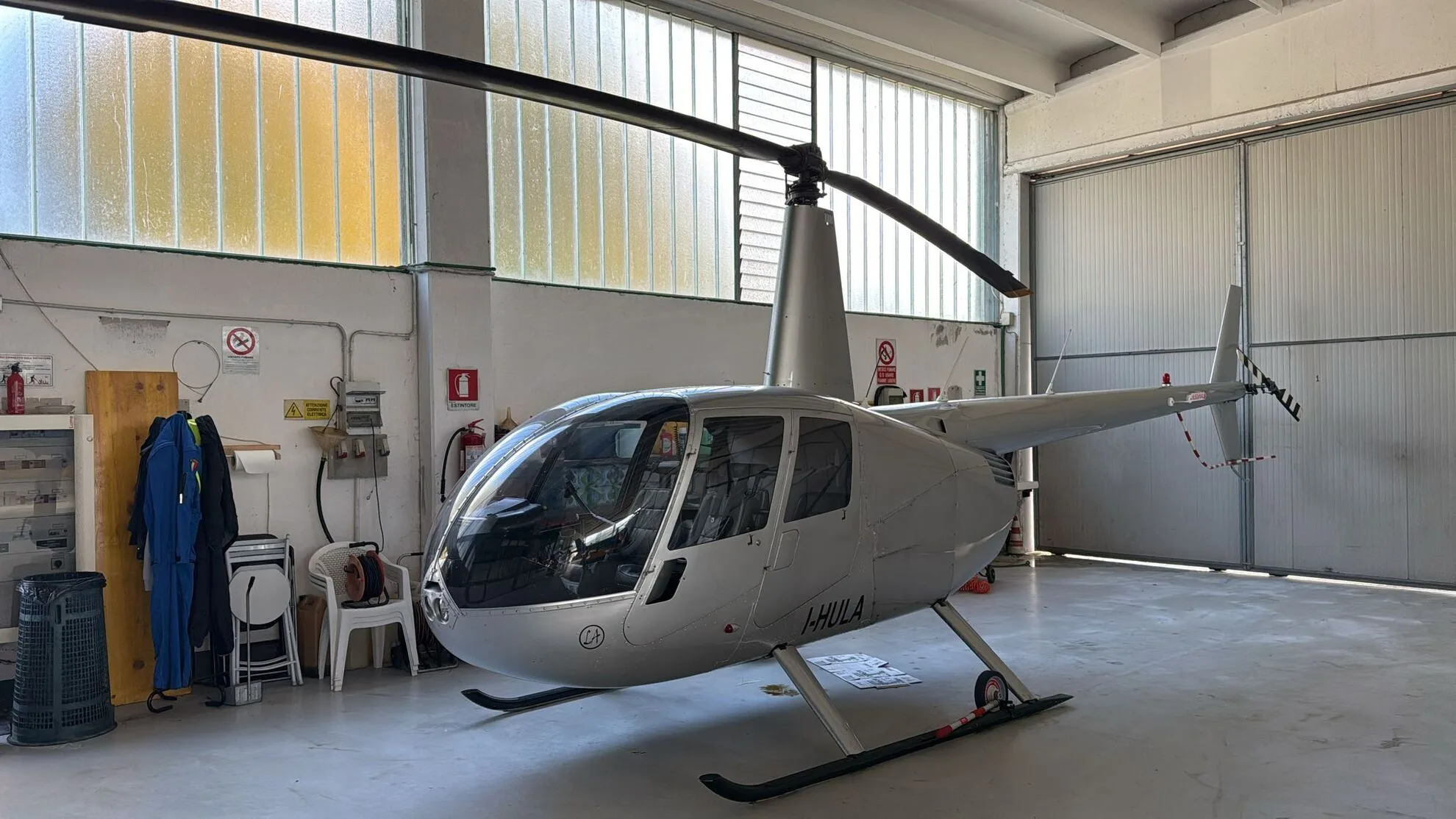 Exterior view of a 2007 Robinson R44 Raven II, I-HULA.