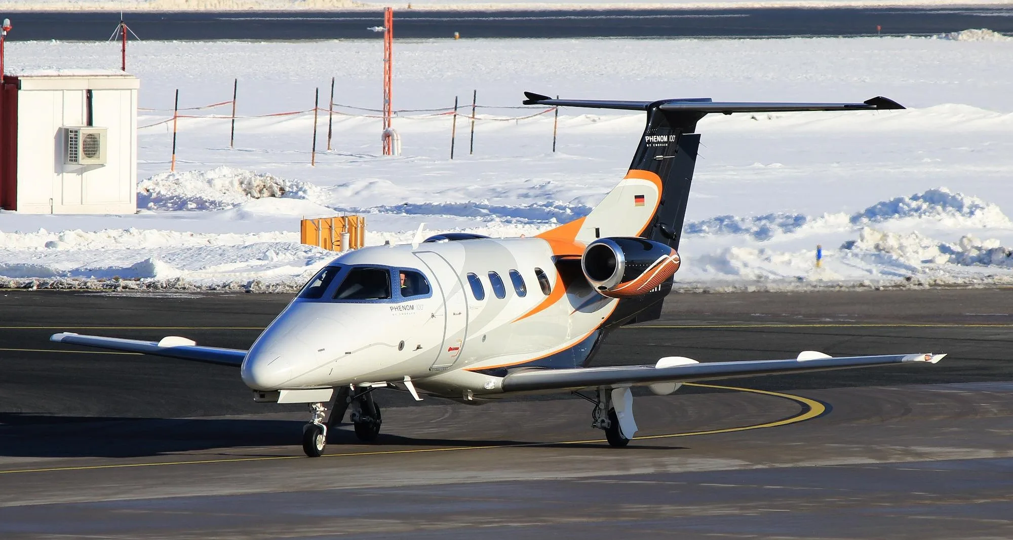 Exterior view of a 2007 Embraer Phenom 100.