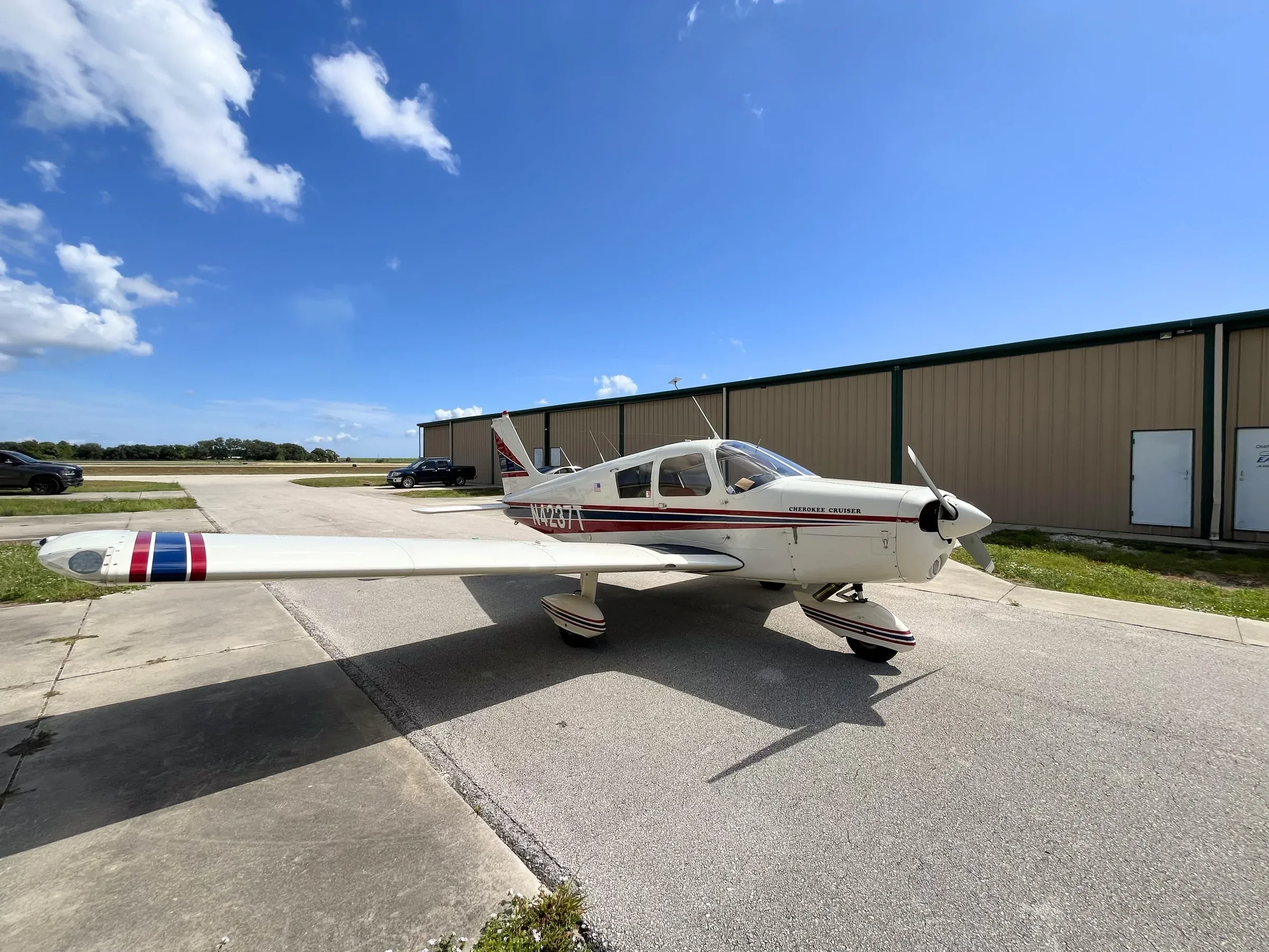 Exterior view of a 1972 Piper Cherokee 140/160, N4237T.