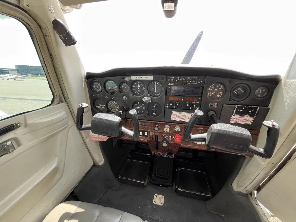 Cockpit and instrument panel of a 1979 Cessna 152.