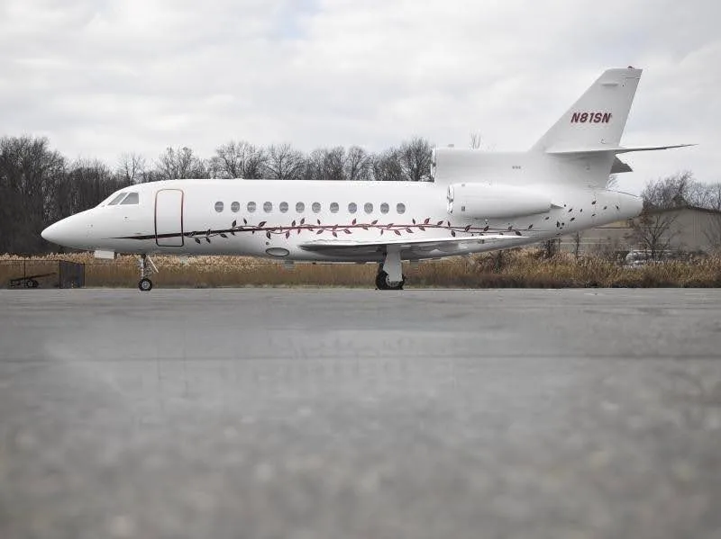 Marketing image of a 1999 Dassault Falcon 900EX Sn 41.