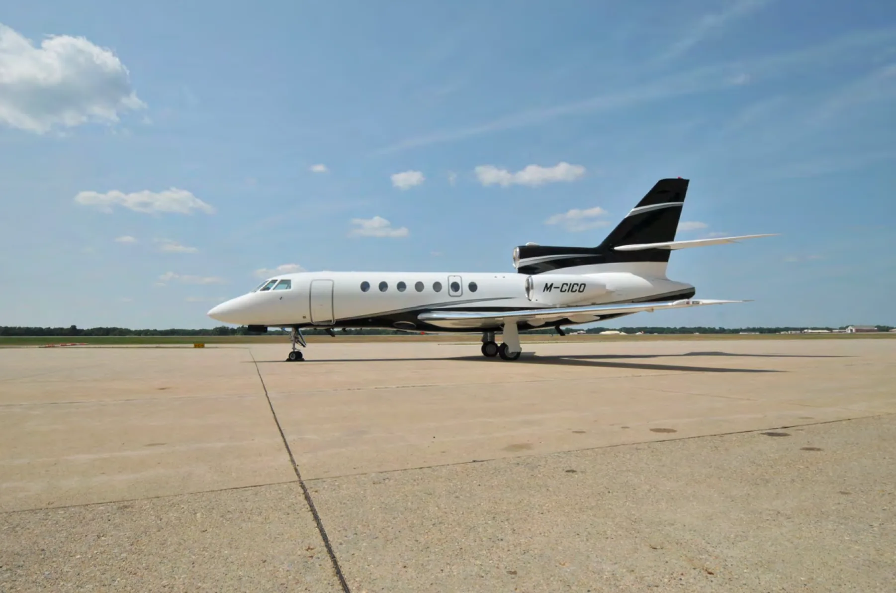Marketing image of a 2006 Dassault Falcon 50EX SN 345.