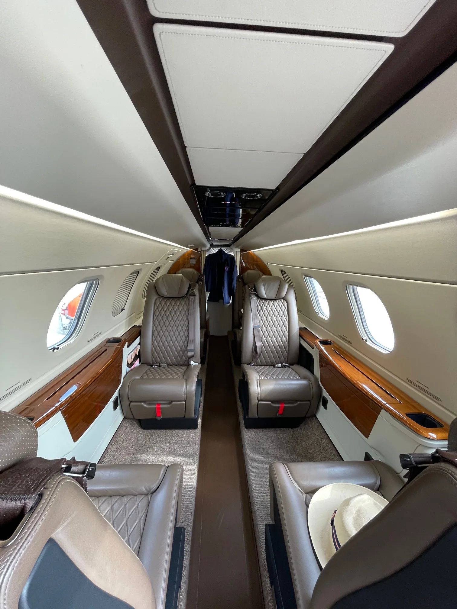 Cabin interior of a 2019 Embraer Phenom 300E.