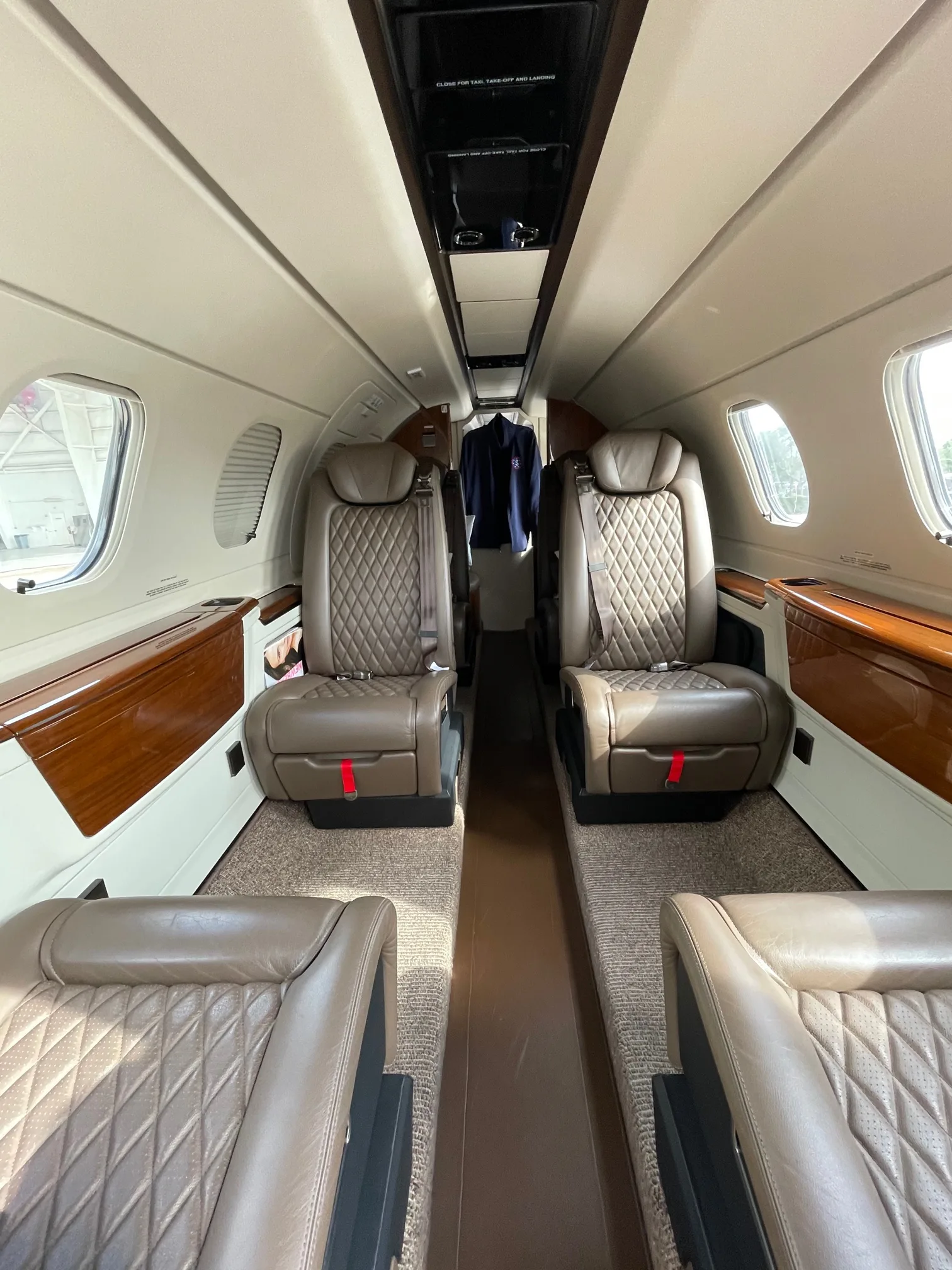 Cabin interior of a 2019 Embraer Phenom 300E.