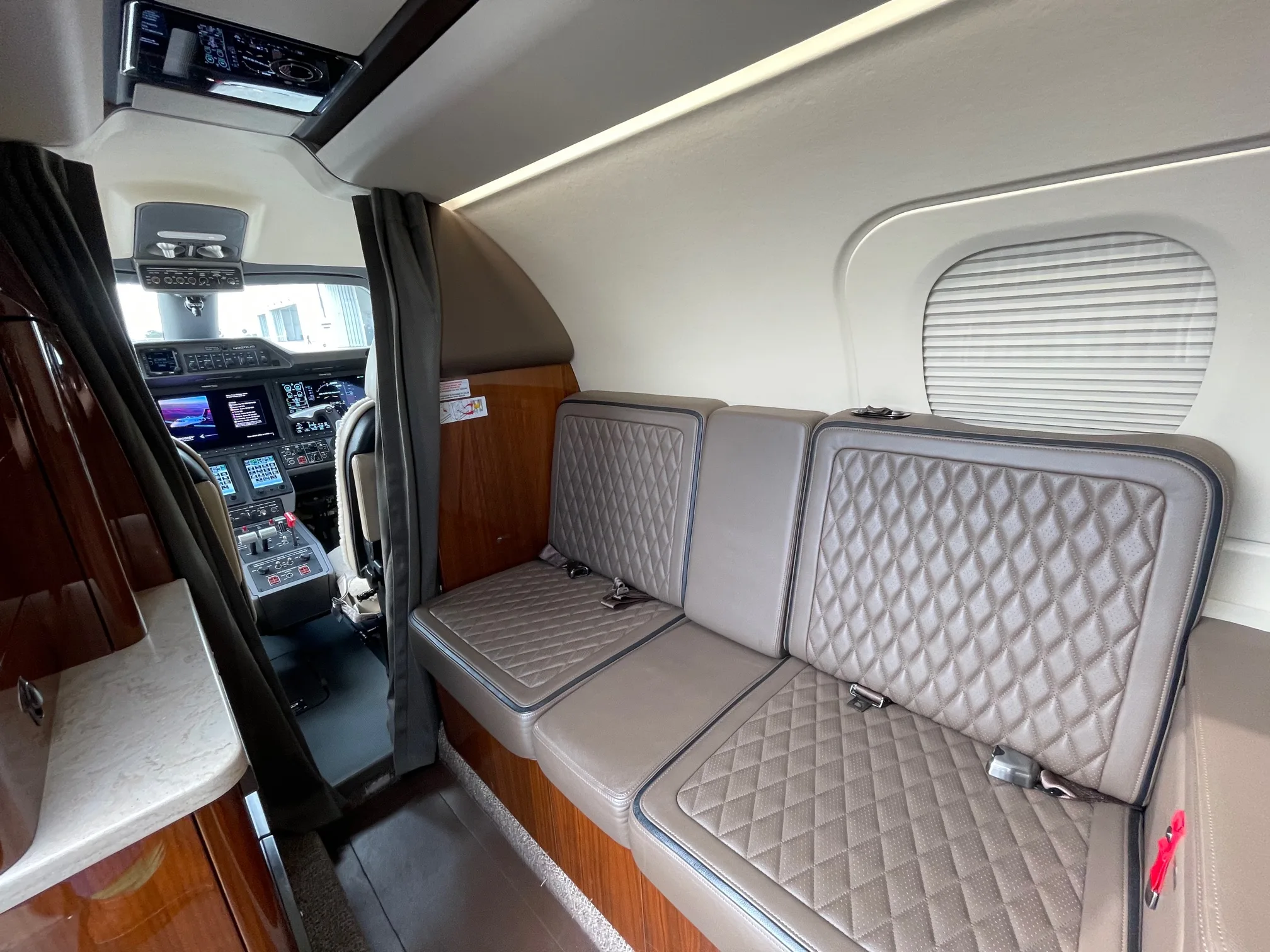 Cabin interior of a 2019 Embraer Phenom 300E.