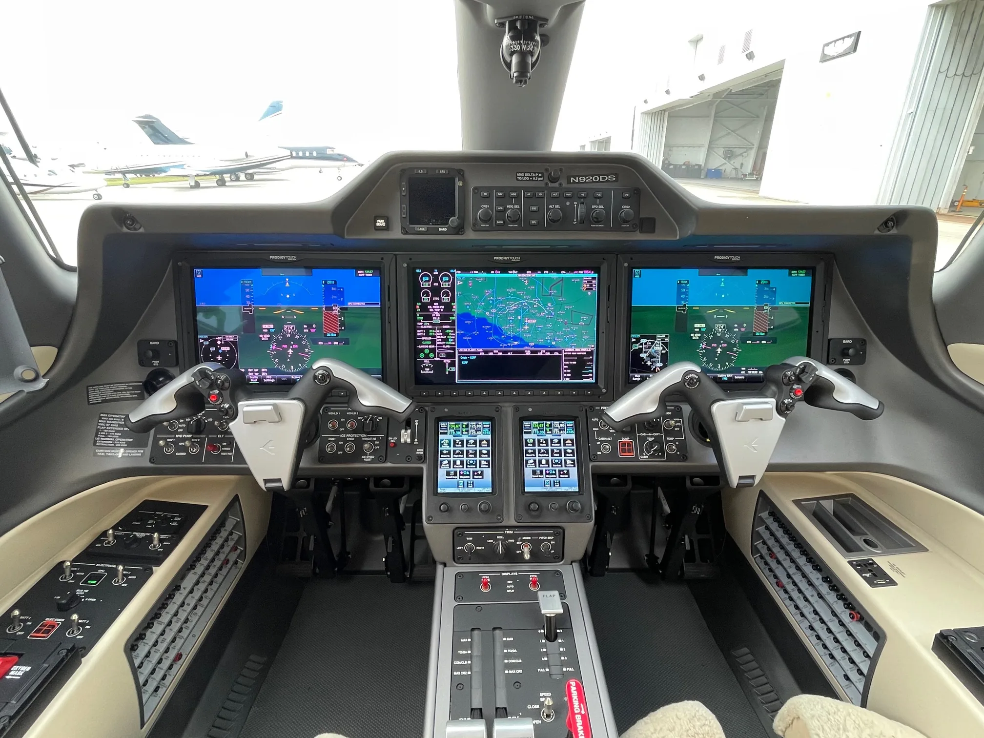 Cockpit and instrument panel of a 2019 Embraer Phenom 300E.