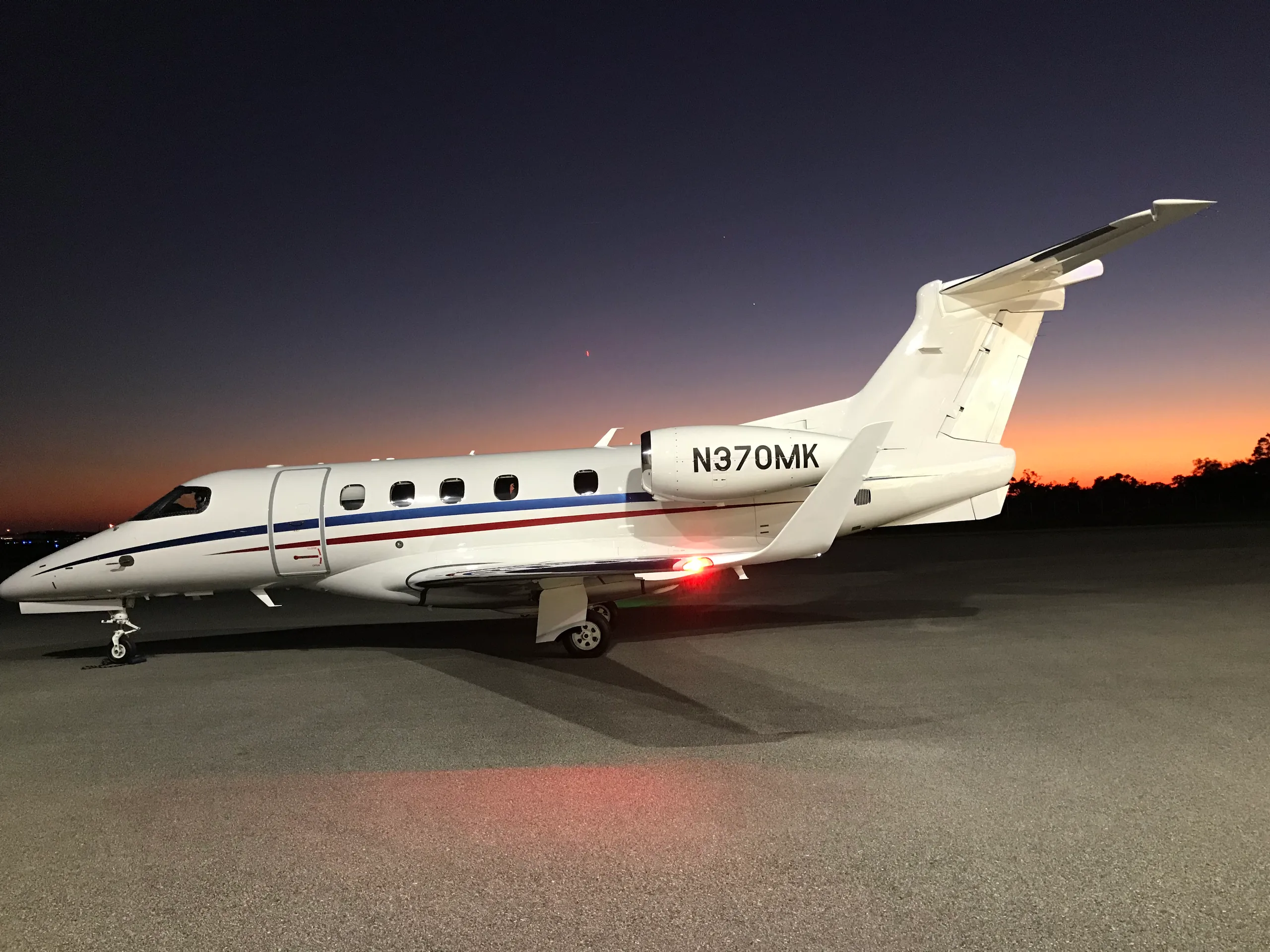 Exterior view of a 2019 Embraer Phenom 300E.