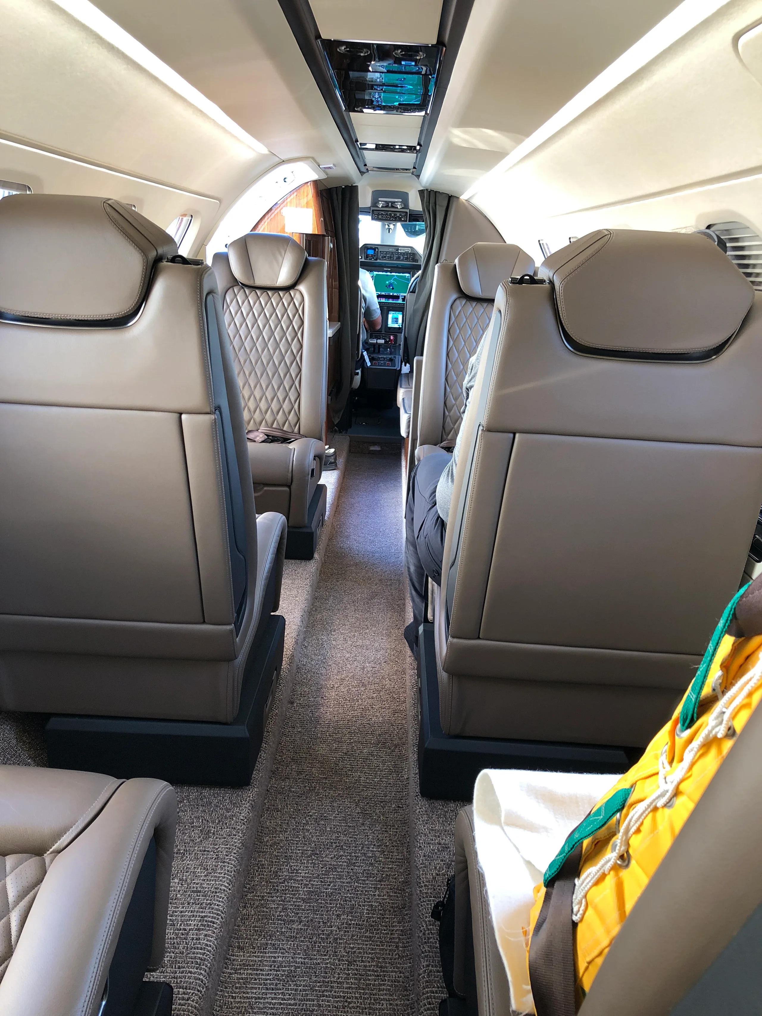 Cabin interior of a 2019 Embraer Phenom 300E.