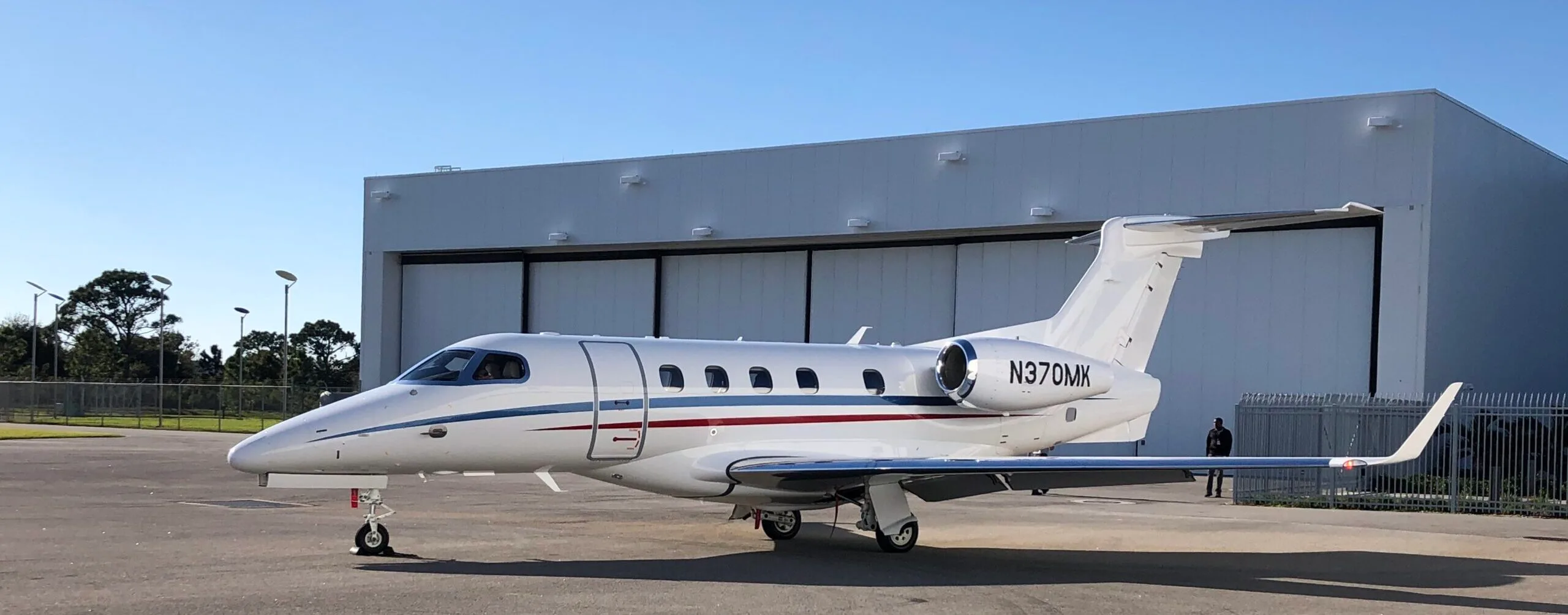 Exterior view of a 2019 Embraer Phenom 300E.