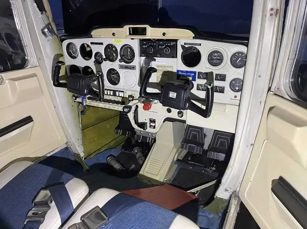 Cockpit and instrument panel of a 1974 Cessna 150.