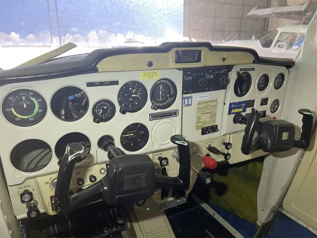 Cockpit and instrument panel of a 1974 Cessna 150.