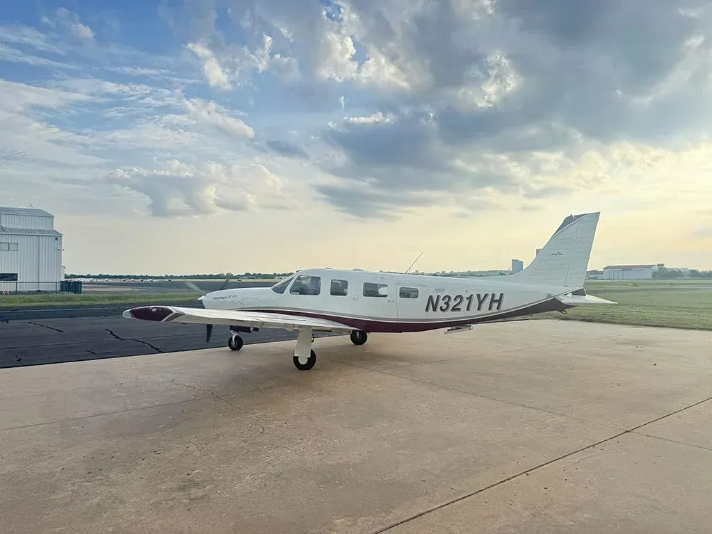 Exterior view of a 2005 Piper Saratoga II, N321YH.
