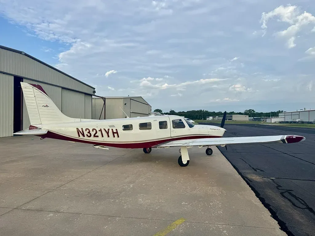 Exterior view of a 2005 Piper Saratoga II, N321YH.
