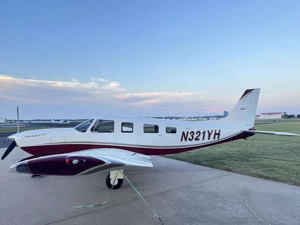 Exterior view of a 2005 Piper Saratoga II, N321YH.