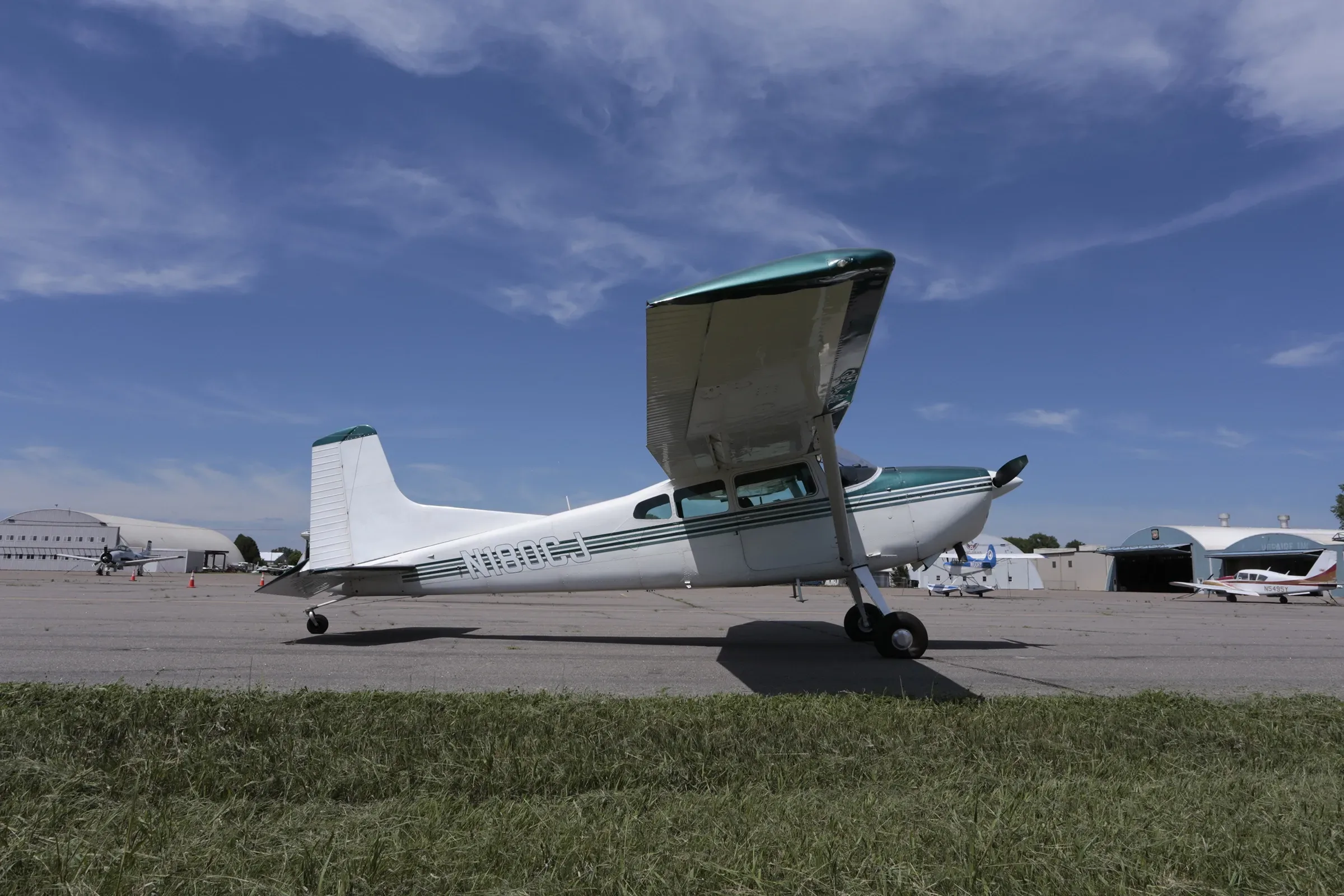 Exterior view of a 1975 Cessna 180, N180CJ.
