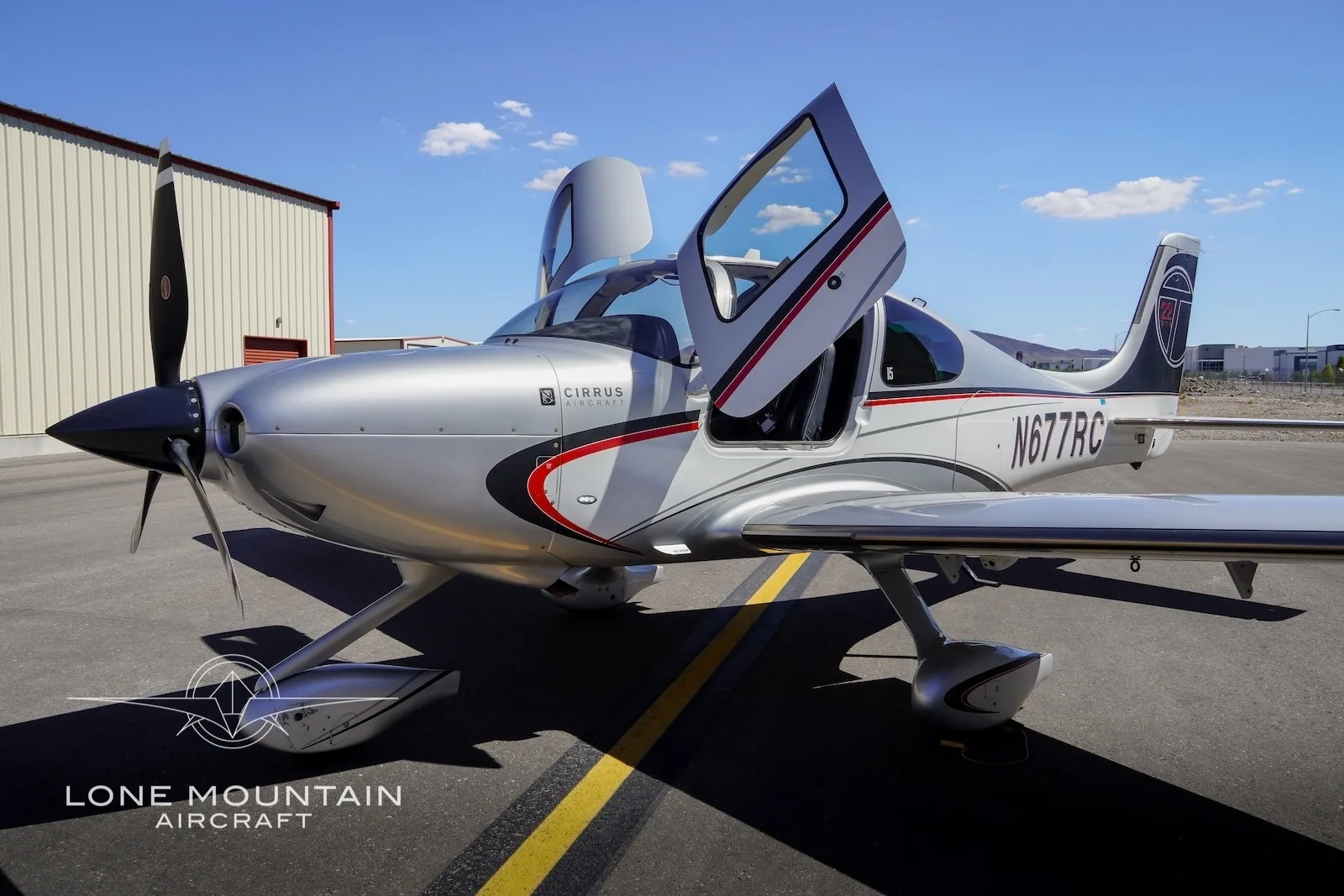 Exterior view of a 2013 Cirrus SR22T G5 GTS, N574TB.