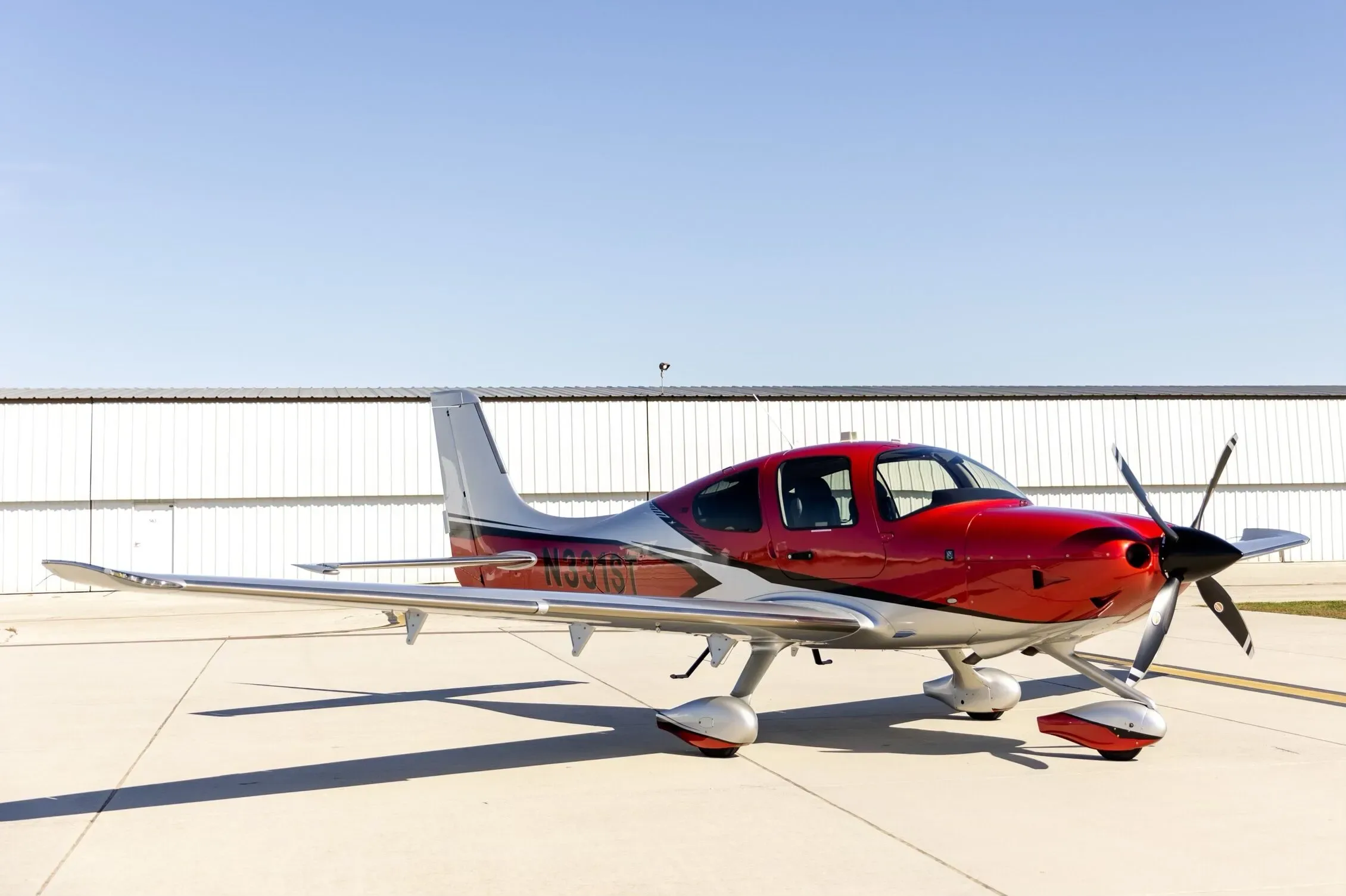 Exterior view of a 2024 Cirrus SR22T G7 GTS, N62TJ.