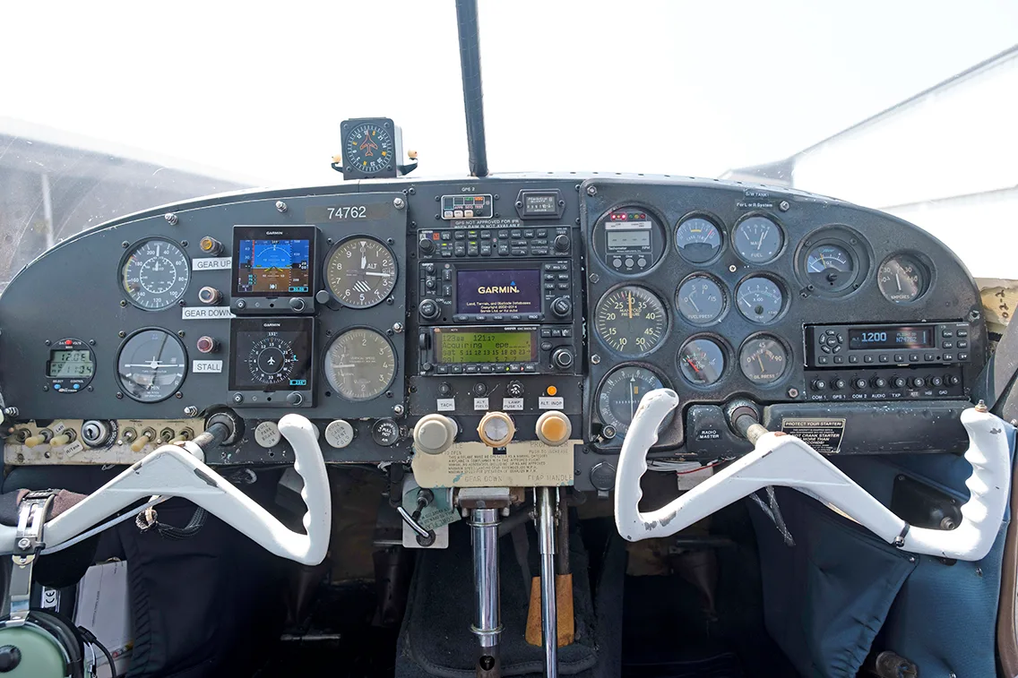 Cockpit and instrument panel of a 1961 Mooney M20B.