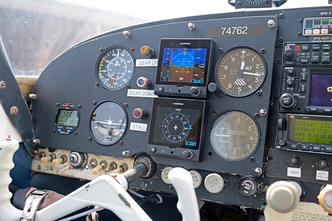 Cockpit and instrument panel of a 1961 Mooney M20B.