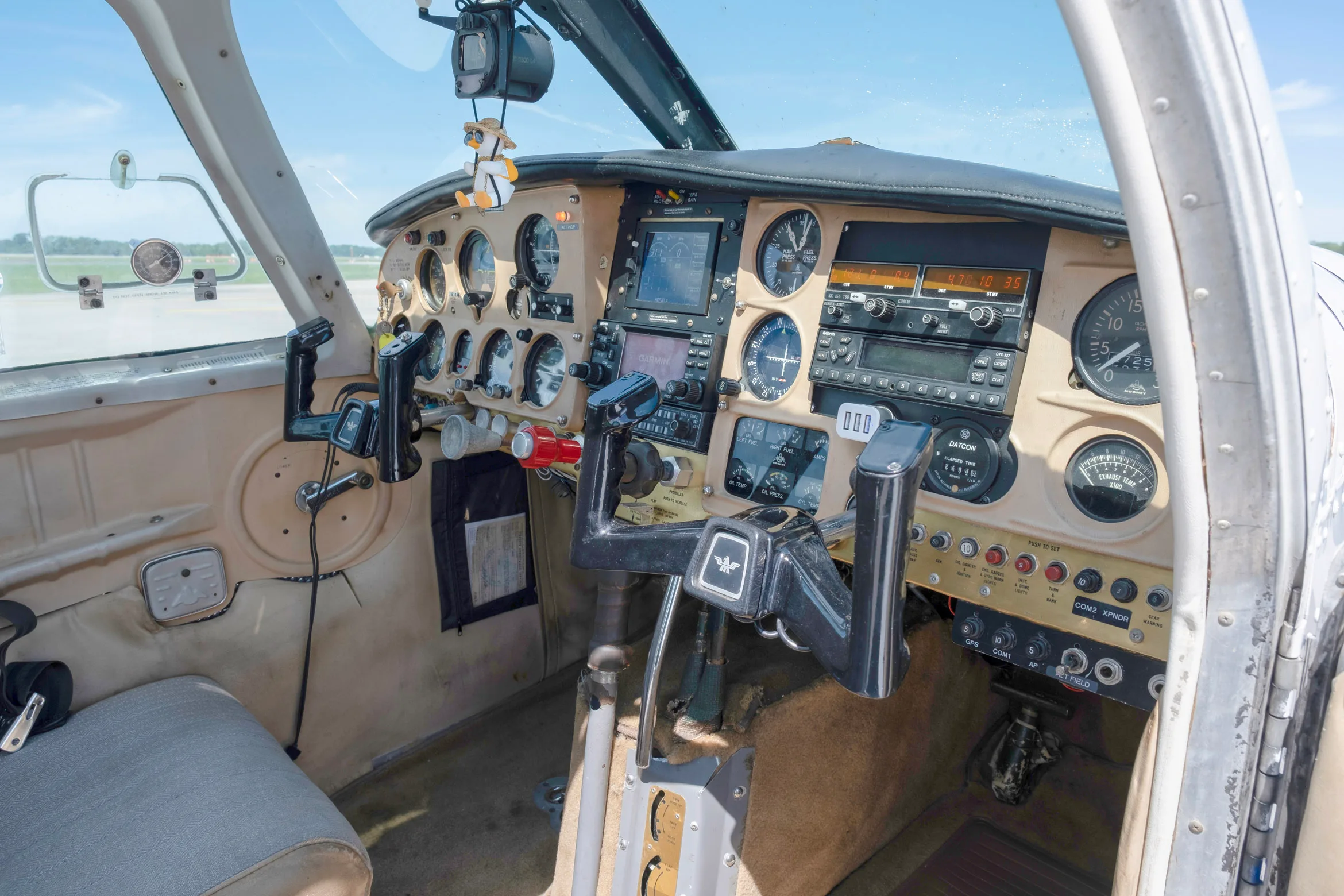 Cockpit and instrument panel of a 1964 Mooney M20D.
