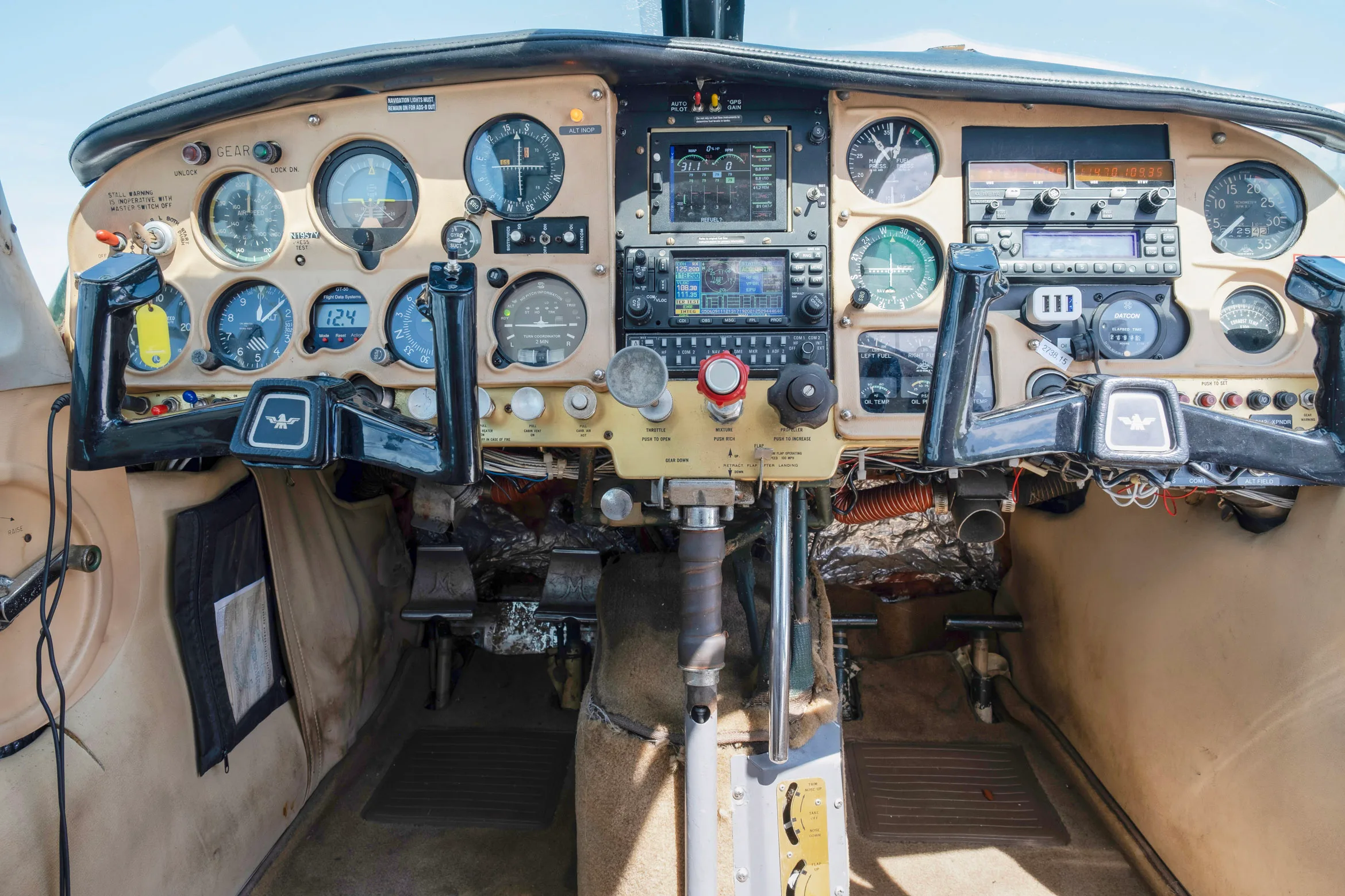 Cockpit and instrument panel of a 1964 Mooney M20D.