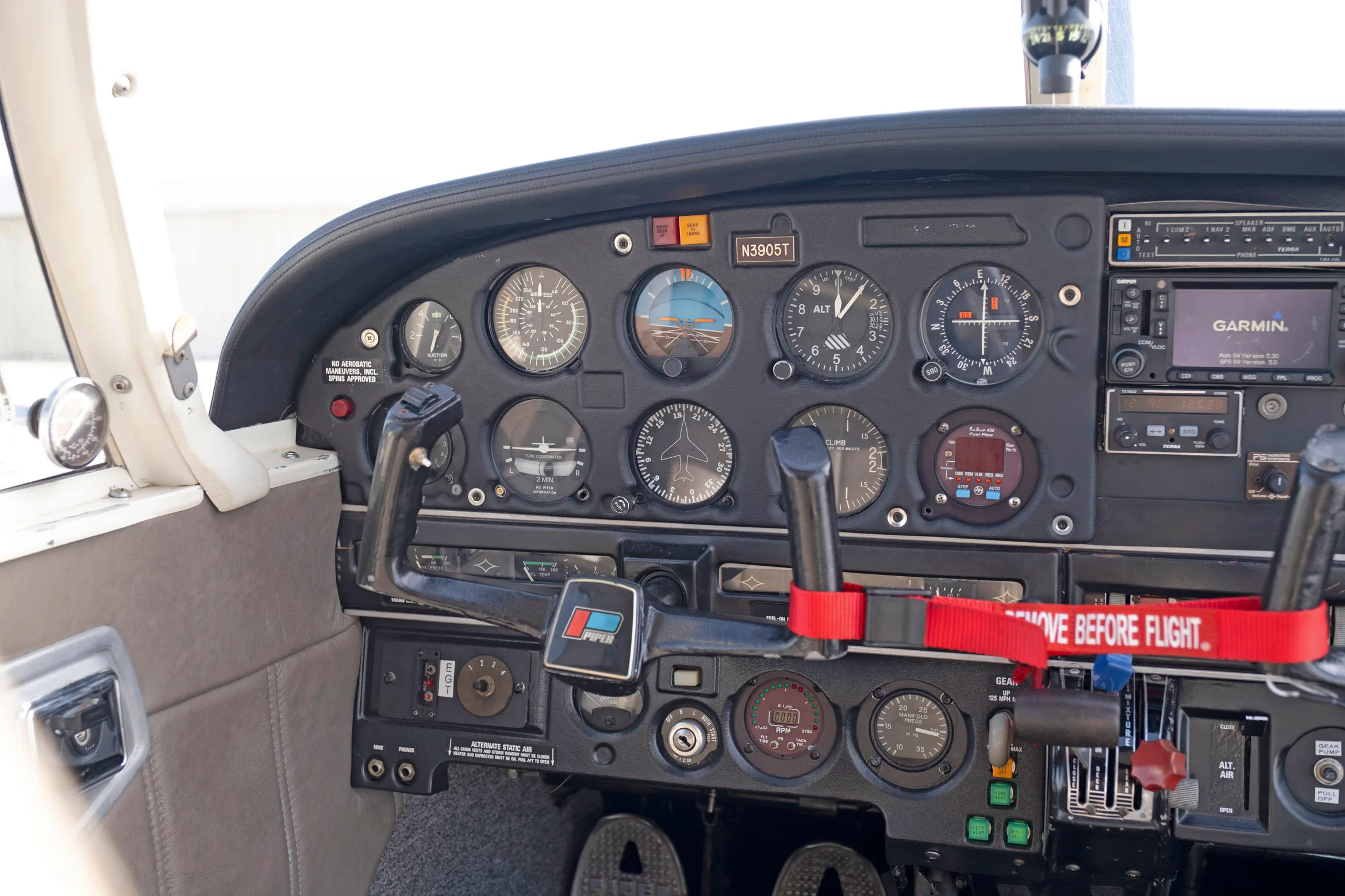 Cockpit and instrument panel of a 1967 Piper PA-28R-180.