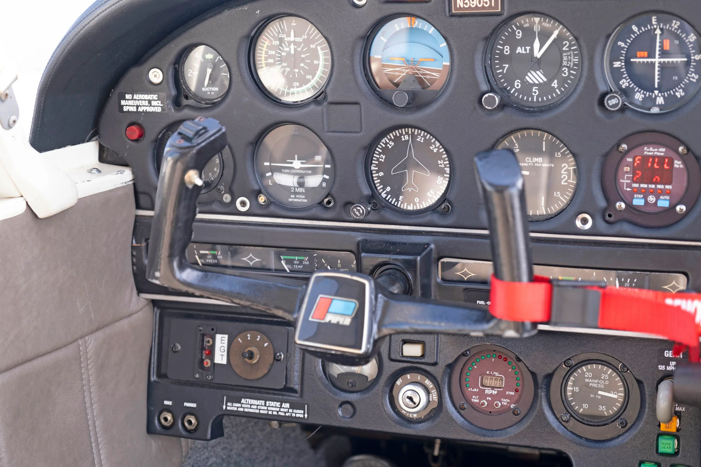 Cockpit and instrument panel of a 1967 Piper PA-28R-180.