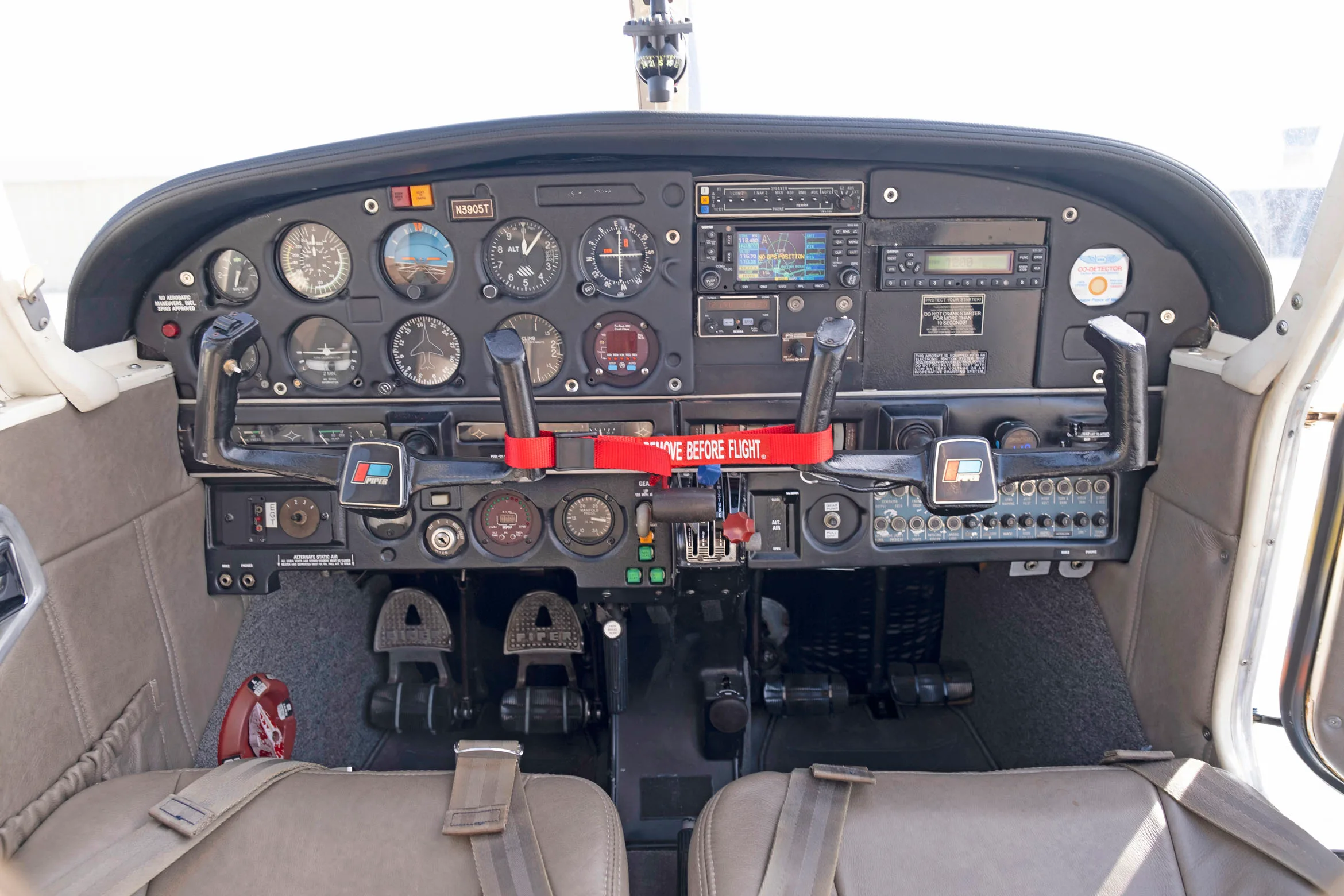 Cockpit and instrument panel of a 1967 Piper PA-28R-180.