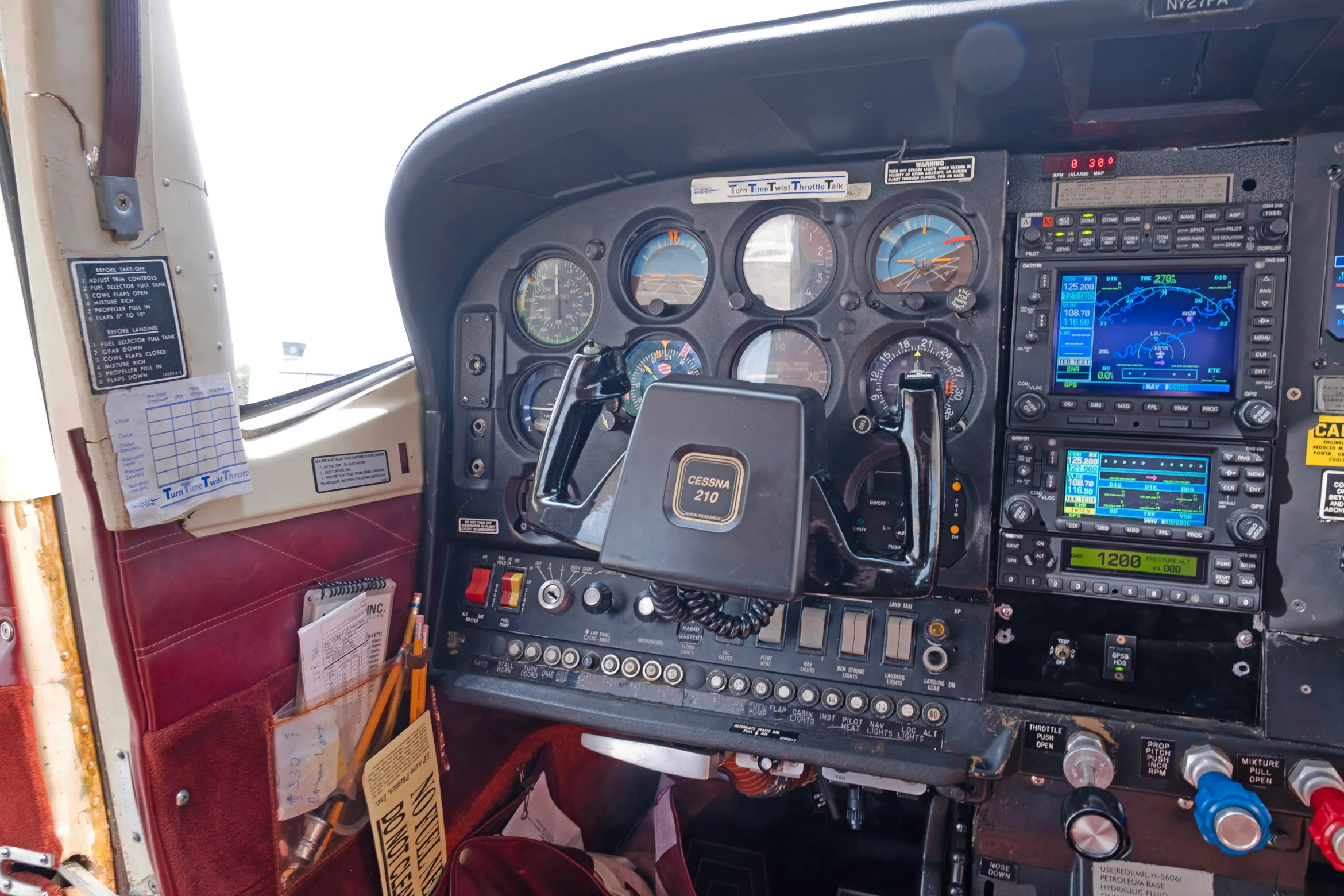 Cockpit and instrument panel of a 1971 Cessna T210K.