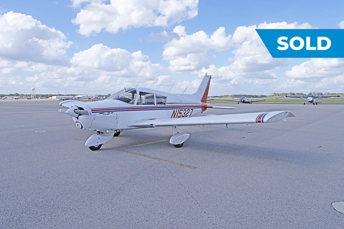 Exterior view of a 1973 Piper PA-28-140, N15327.