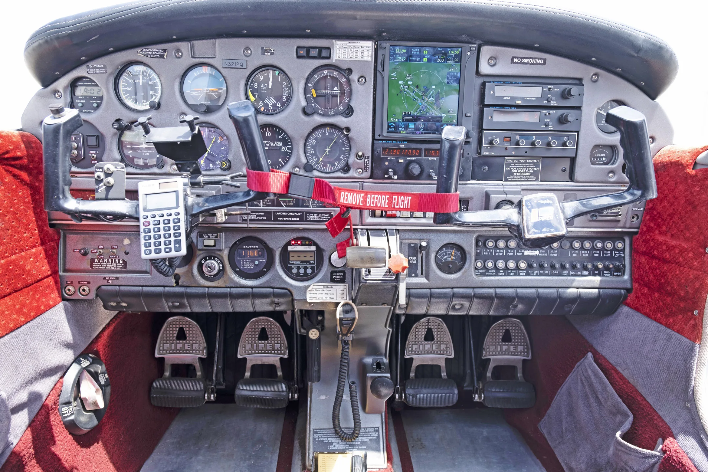 Cockpit and instrument panel of a 1977 Piper PA-28-181.