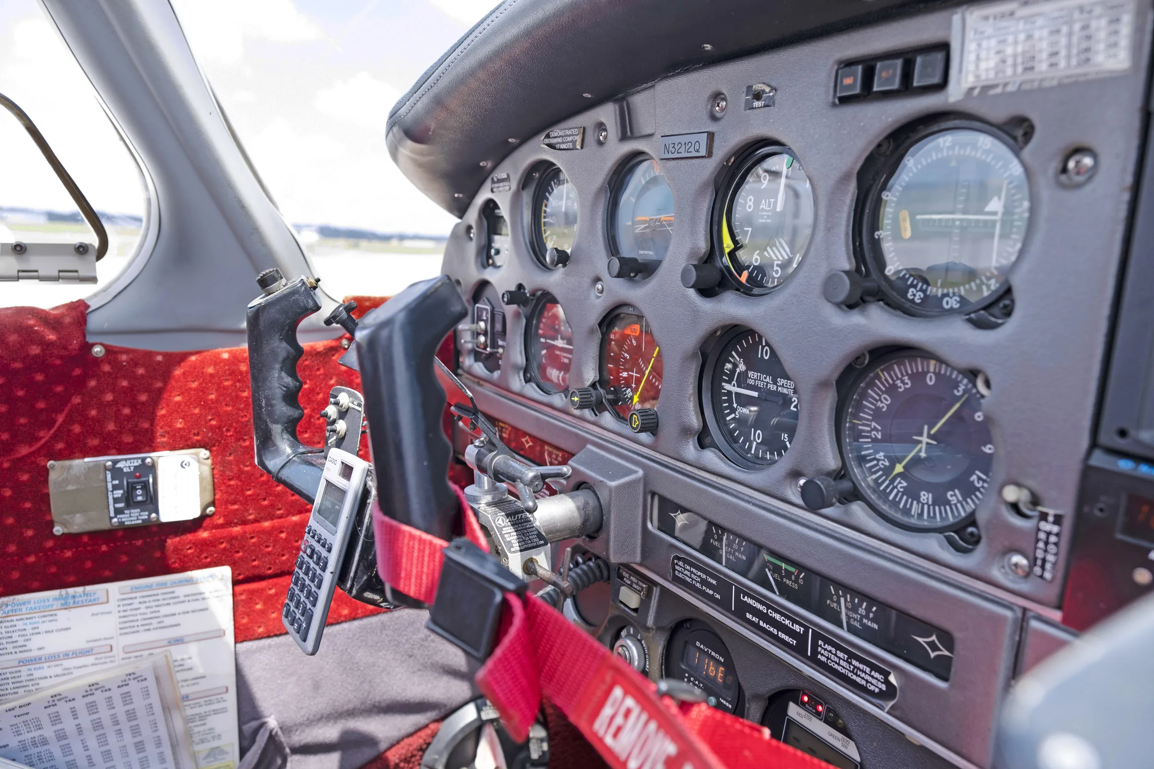 Cockpit and instrument panel of a 1977 Piper PA-28-181.