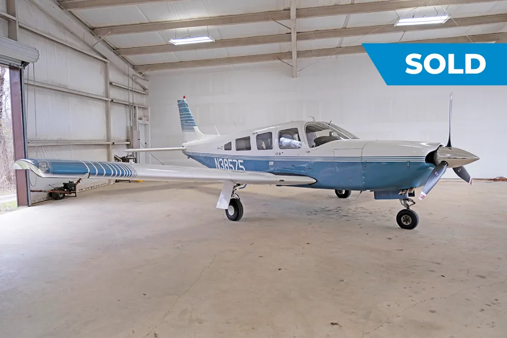 Exterior view of a 1977 Piper Lance, N38575.