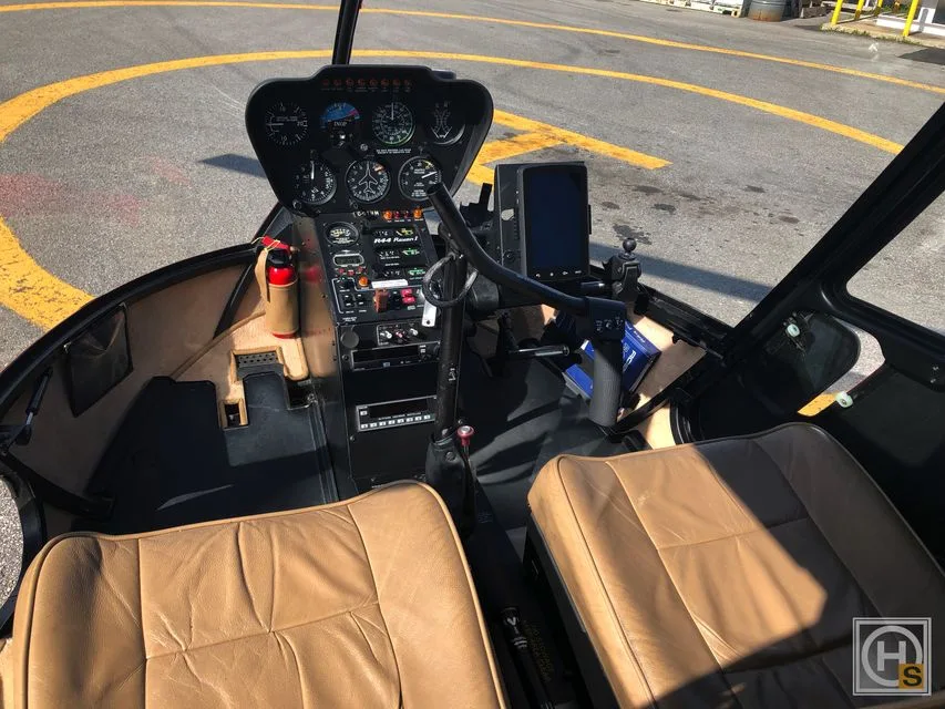 Cockpit and instrument panel of a 2008 Robinson R44 RAVEN I – GTHM.